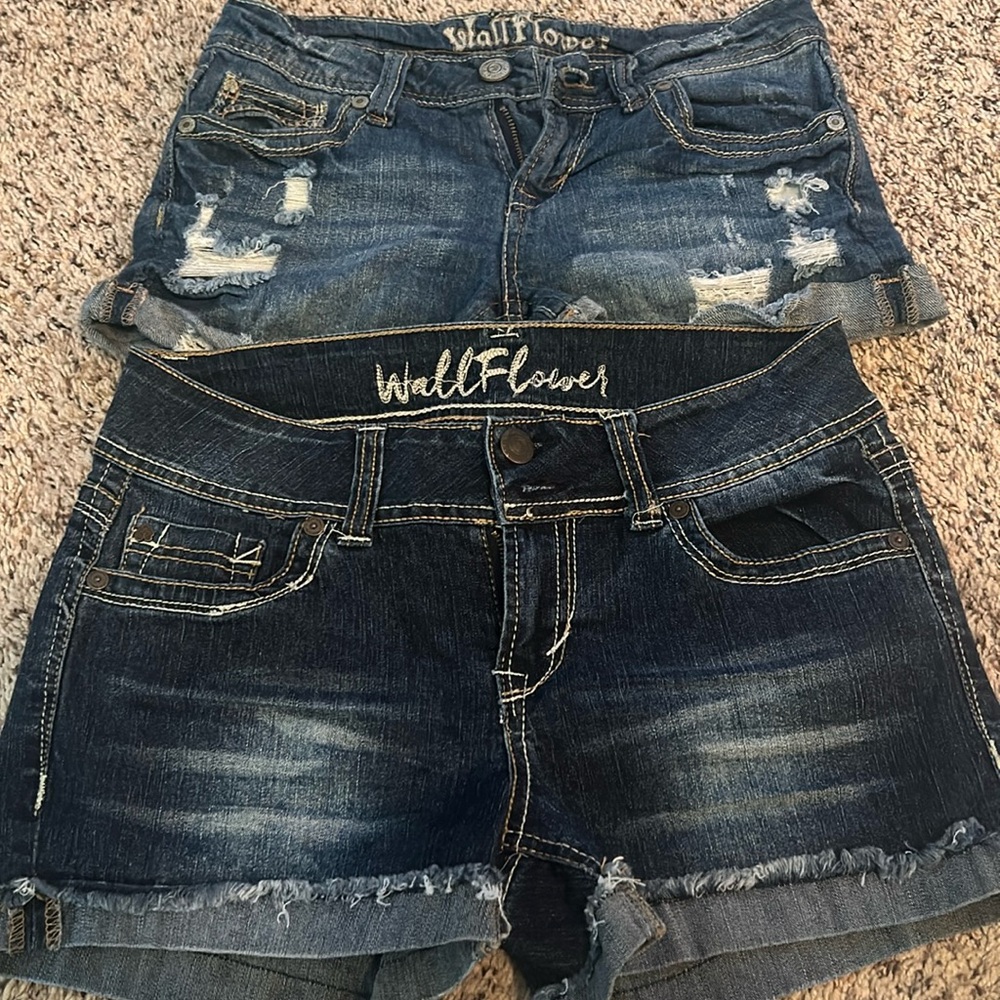 2pair WallFlower jeans shorts. Pre worn. Size 5.Stitched with bling on pockets.